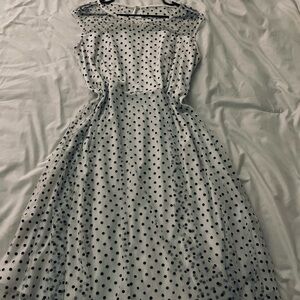 Polka Dot Midi Dress mesh overlay at the top.